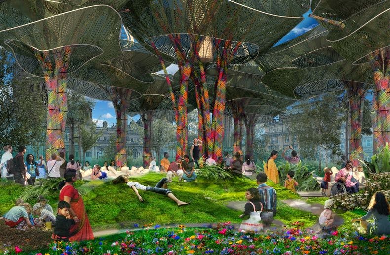 Various people relaxing under a canopy of synthetic trees in the centre of Birmingham